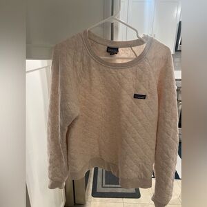 Patagonia women’s quilted crewneck sweater.
